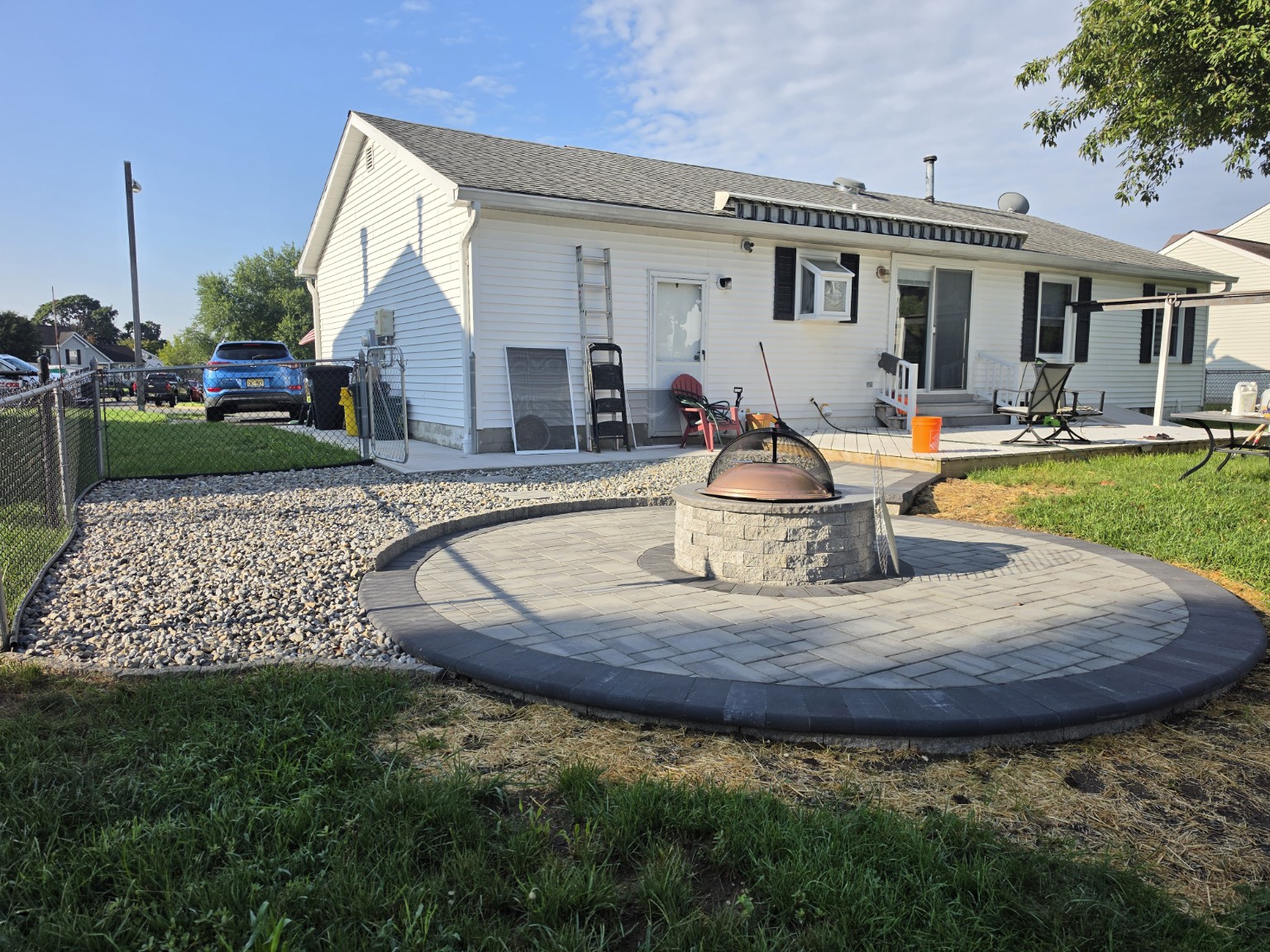 Circular paver patio with fire pit